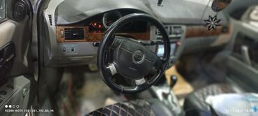 Chevrolet: Chevrolet Lacetti: 1.8 l | 2005 il Sedan — 6