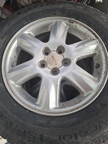vector: Комплект колес Subaru на дисках + всесезонные шины Goodyear - Диски — 1