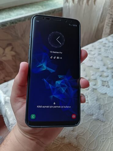 телефон с определителем номера: Samsung Galaxy S9 Plus, цвет - Черный, Отпечаток пальца, Беспроводная зарядка, Две SIM карты