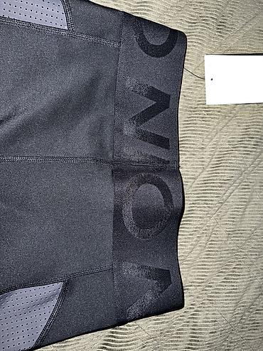 vikend torba: NIKE Pro Sculpt 7/8 Women's Training Tights vel. S 
IB9144 010 — 10