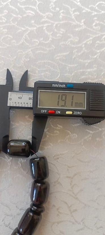 təsbeh kəhraba: 100% təbii, bütöv daş kəhrəba təsbeh.iri həcmli,33 muncuq.Çəkisi 115 — 4