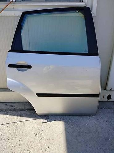 Auto-delovi: ZADNJA DESNA VRATA ZA FORD FIESTA OD 2002. DO 2008. GOD. | Zadnja — 1