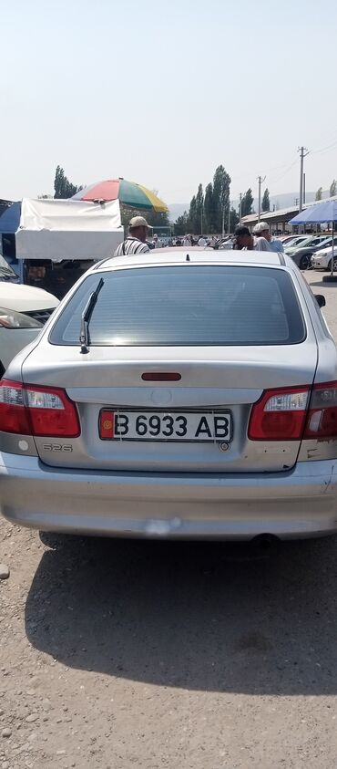 холодильник для машина: Mazda 626: 2000 г., 2 л, Механика, Бензин, Седан