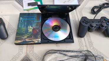 PS2 & PS1 (Sony PlayStation 2 & 1): Playstation 2 əla vəziyətdə Həm disklə işləyir həmdə flaşka ilə 9 ədəd — 4