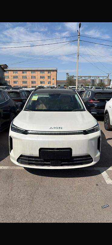 byd e2: Aion (белый, хэтчбек/кросс-седан). Ключевые особенности: - Полностью — 1