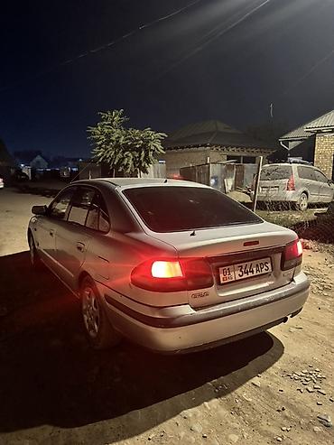 audi 100: Mazda 626: 1997 г., 1.8 л, Механика, Газ, Седан — 2