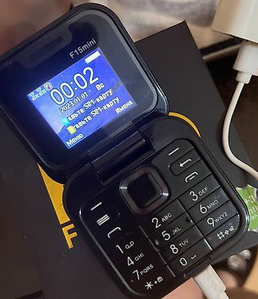 mini radio: F15 mini qapaqlı mobil telefon Xüsusiyyətlər: - Qapaqlı (flip) — 2