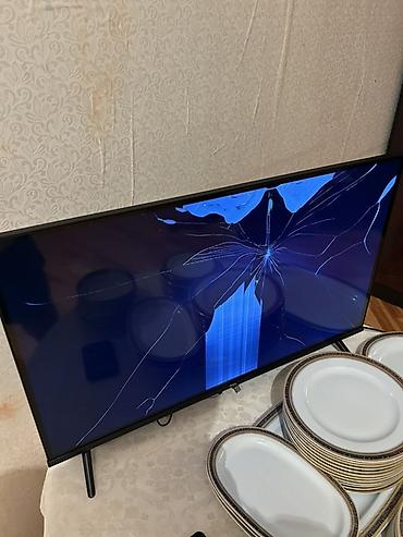tv box android: TCL smart televizor (təqr. 43–50 düym arası, nazik çərçivəli, iki — 1