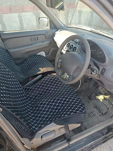ka 3: Nissan March: 2001 г., 1.3 л, Автомат, Бензин, Хэтчбэк — 6