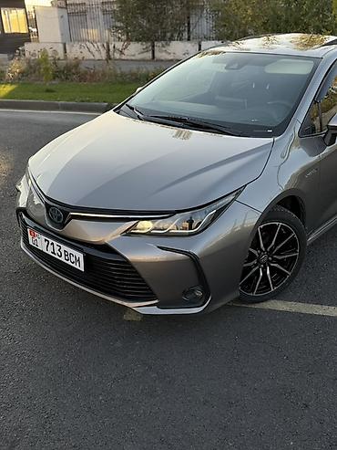 byd e9 1: Toyota Corolla: 2019 г., 1.8 л, Вариатор, Гибрид, Седан — 5
