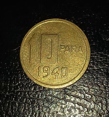 Sikkələr: Türkiyə sikkələri 10 para 1940, Dəlikli 1 kuruş 1950, İksi biryerdə