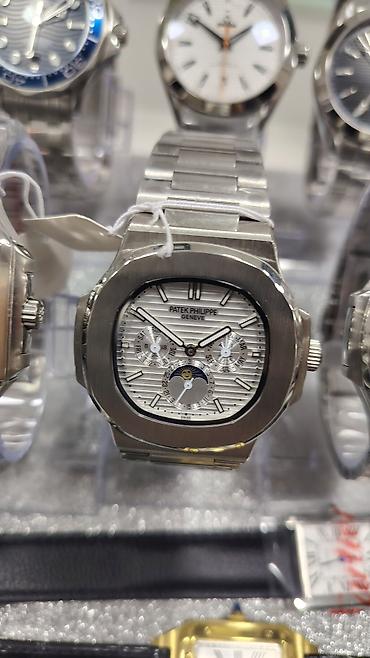 bakida saat: Patek Philippe Nautilus üslubunda kişi saatları – polad korpus və — 4