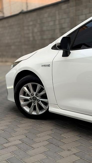 voxy noah: Toyota Corolla: 2024 г., 1.8 л, Вариатор, Гибрид, Седан — 3