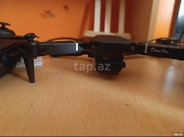 oyunca: E88 Pro Brushless Drone - 5G siqnal itkisinə qarşı qoruma - 2.4 GHz — 3