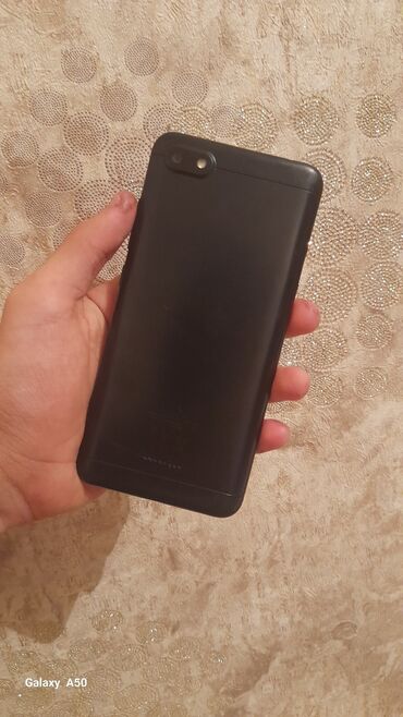 телефон fly ds124: (DİQQƏTLƏ OXU) Smartfon (qara rəng) - Arxa hissə: plastik korpus, sol