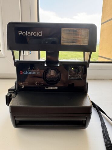 polaroid: Продается фотоаппарат Polaroid без кассет в отличном состоянии