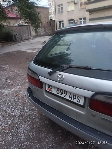 акамуляторы: Mazda 626: 1998 г., 1.8 л, Механика, Бензин, Универсал — 4