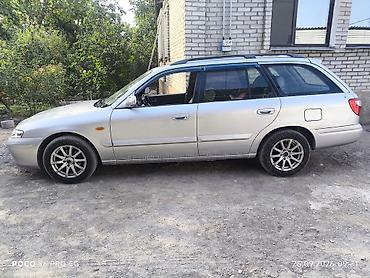 синбей групп: Mazda Capella: 2001 г., 2 л, Механика, Бензин, Универсал — 5