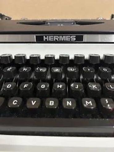 Stari uređaji: Hermes 550 – prenosna mehanička pisaća mašina - Model: Hermes 550 — 13
