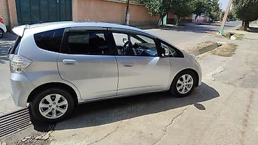 авто для такси: Honda Fit: 2011 г., 1.5 л, Вариатор, Гибрид, Седан — 6