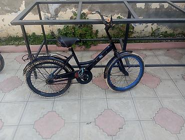 gitara qara: 20 lik uşag velosipedi. oturacag, pedallar ve iki tekerde teze alinib — 2