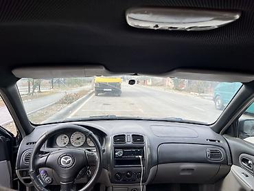 мазда 620: Mazda Familia: 2003 г., 1.6 л, Механика, Бензин, Хэтчбэк — 10
