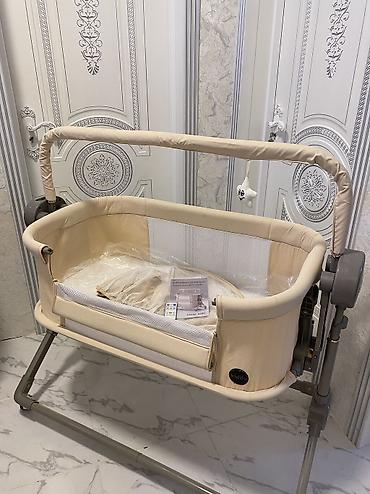 yumru besik: Oğlan və qız üçün, Yeni, Yumru, Beşik, Dəst ilə, Matras ilə, Yellənmə mexanizmi ilə — 1