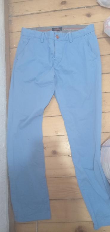 bele košulje: Hermès muške pantalone – model chino, svetloplave boje. - Brend — 4