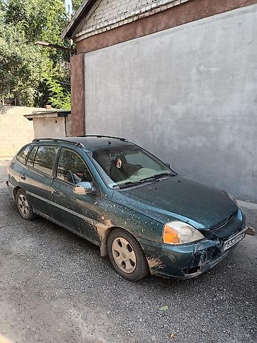 жд тупик: Kia Rio универсал (поколение начала 2000‑х), зеленый металлик машину — 1