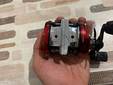 Ovçuluq və balıqçılıq: Abu Garcia Ambassadeur 6600SX multiplier reels red black. 5.3:1 gear — 9