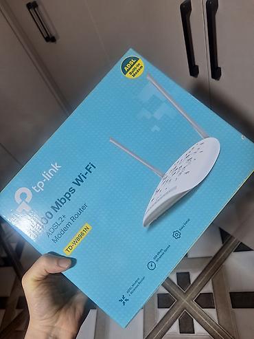 planşet alıram: TP-Link TD-W8961N ADSL2+ Modem Router - 300 Mbps sürətə qədər Wi‑Fi - — 1