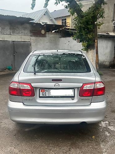 Mazda: Mazda Capella: 2000 г., 1.8 л, Механика, Бензин, Хэтчбэк — 9