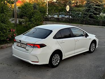 tayota progres: Toyota Corolla: 2021 г., 1.8 л, Вариатор, Гибрид, Седан — 4