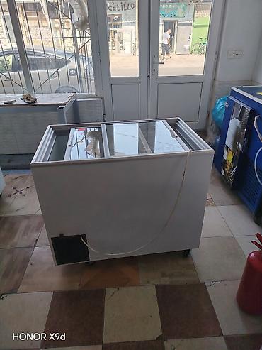 Soyuducu avadanlığı: Sürüşən şüşə qapaqlı vitrin tipli dondurucu. Ağ rəngli korpusa — 2