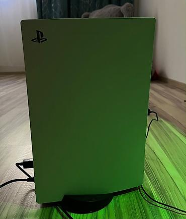 PS5 (Sony PlayStation 5): PlayStation 5 (PS5) oyun konsolu + DualSense idarəetmə pultu - — 1