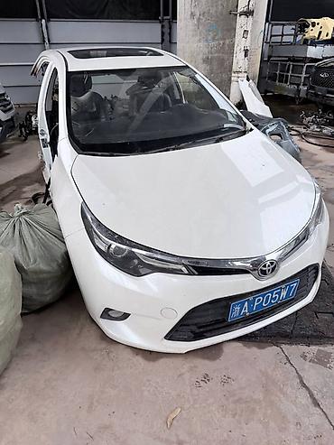 levin corolla: Разбор Toyota Corolla (седан, белый, поколение около 2013–2016). В — 2