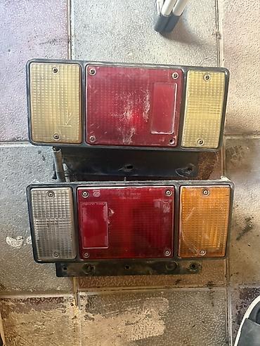 06 ti ehtiyat hisseleri: Isuzu üçün orijinal kuzov işıqları və emblemlər dəsti Tərkib: - Arxa — 1