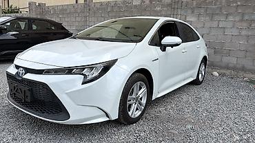 Toyota Corolla: 2021 г., Гибрид, Седан