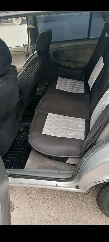 exceed vx: Daewoo Nexia: 2003 г., 1.5 л, Механика, Бензин, Хэтчбэк — 7