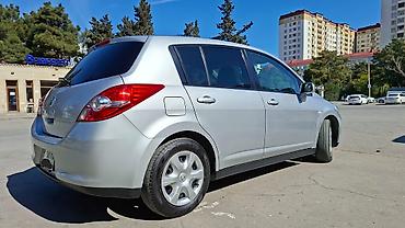 Nissan: Nissan Tiida: 1.5 l | 2011 il Hetçbek — 3