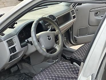 Mazda: Mazda Demio: 2002 г., 1.5 л, Автомат, Бензин, Купе — 4