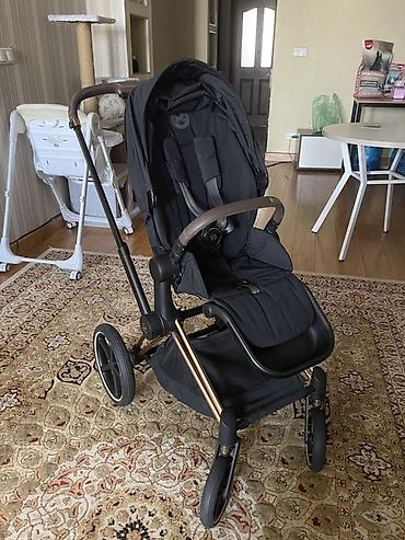 ам ням: Прогулочная коляска Cybex (линейка Priam 4— фирменная эмблема и бренд — 1