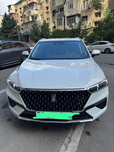 фольксваген поло новый кузов комплектации и цены: FAW T77 – ağ rəngli, şəhər və uzun yola uyğun müasir krossover