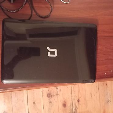 compaq laptop: HP Compaq noutbuk - Model: Compaq (üst qapaqda Compaq loqosu, daxildə — 1