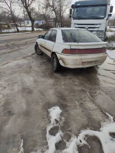 Mazda: Mazda 323: 1990 г., 1.3 л, Механика, Бензин, Купе