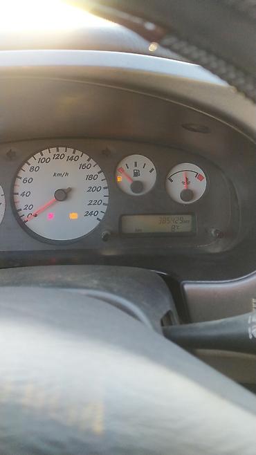 c 220: Nissan Primera: 2001 г., 1.8 л — 2