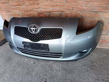 startac: PREDNJI BRANIK SIVI ZA TOYOTA YARIS OD 2005. DO 2011. GOD. | Prednji — 1
