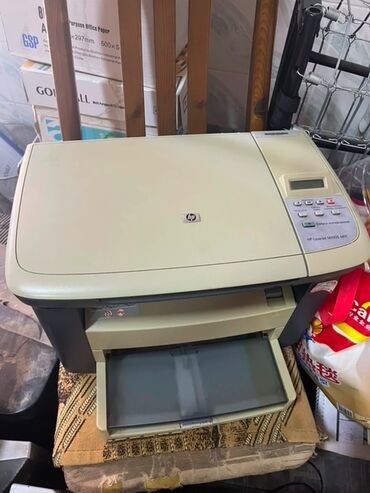 демисезонная одежда: Принтер HP laserjet m1005 Предлагается многофункциональное устройство