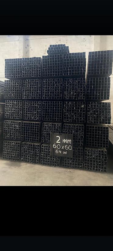 Metal məhsulları: Qara rəngdə, kvadrat formalı metal profillər. Tikinti və konstruksiya — 2