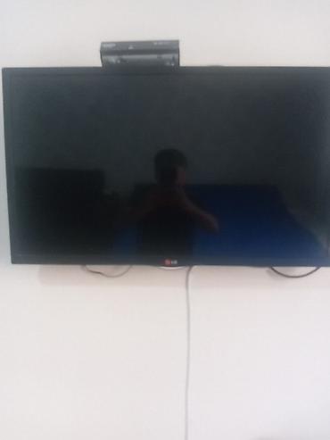 Televizorlar: LG markalı düz ekran televizor. Qara rəngli, nazik çərçivəli dizayna — 1